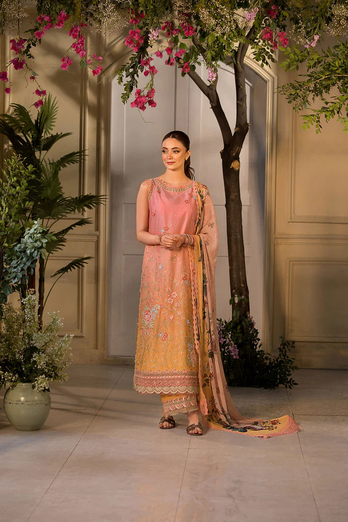 Model wearing peach and yellow embroidered dress from Sobia Nazir Vital 2025 Design 11B. Pakistani luxury pret clothes online in UK.
