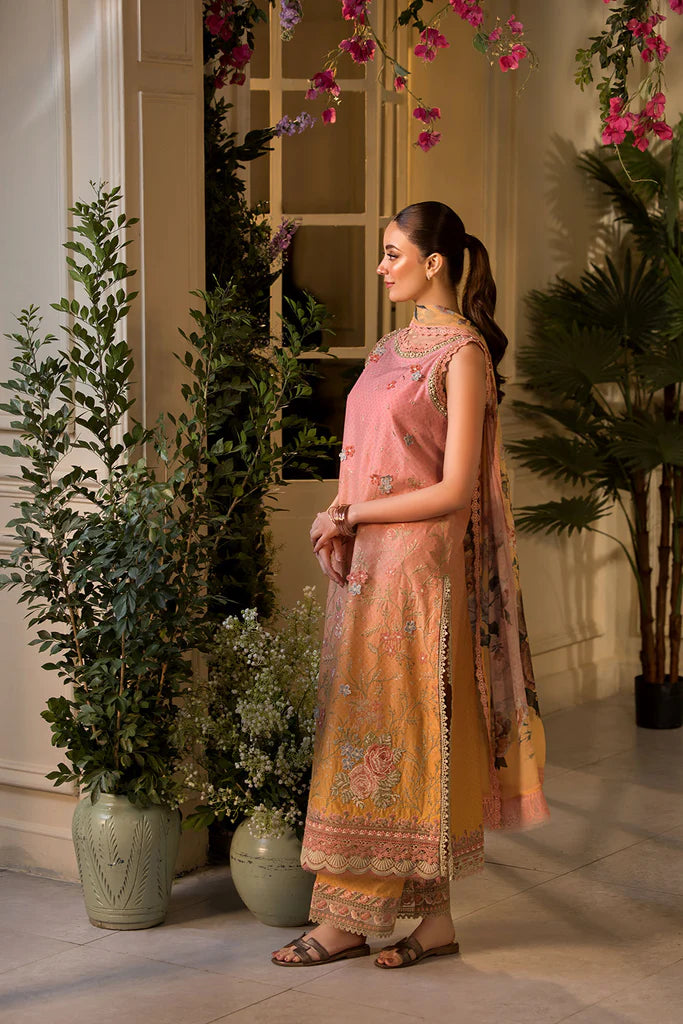 Model wearing peach and yellow embroidered dress from Sobia Nazir Vital 2025 Design 11B. Pakistani luxury pret clothes online in UK.