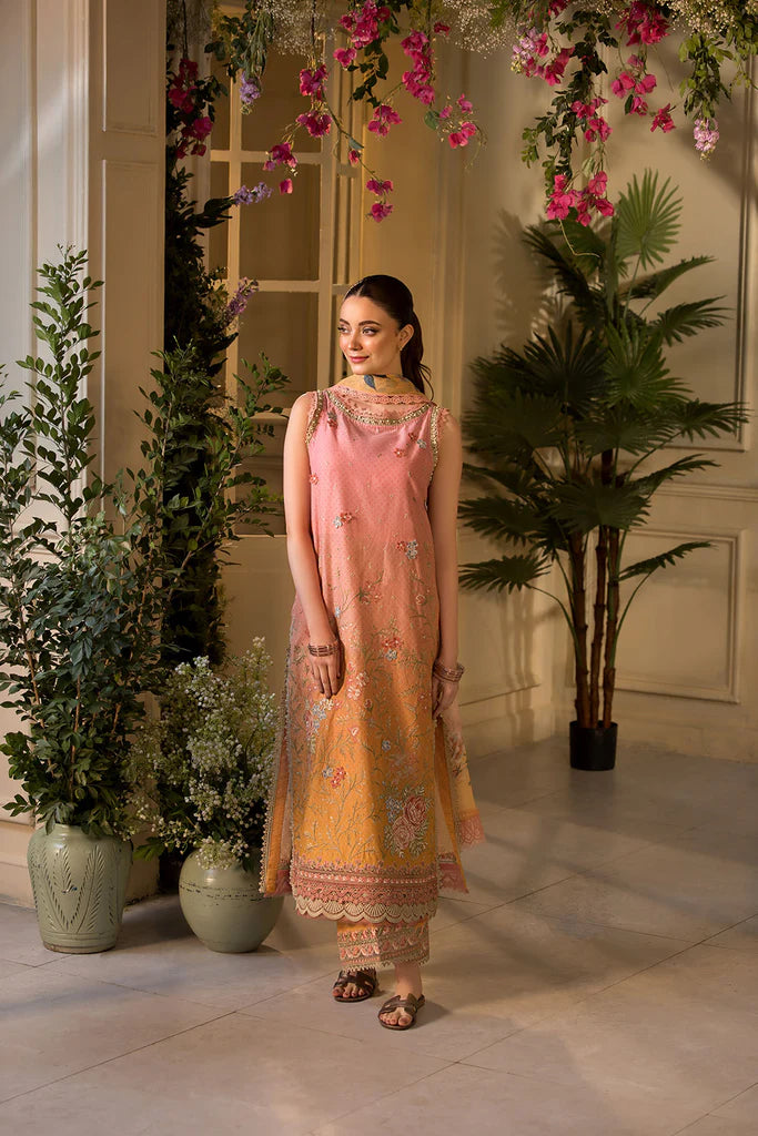 Model wearing peach and yellow embroidered dress from Sobia Nazir Vital 2025 Design 11B. Pakistani luxury pret clothes online in UK.