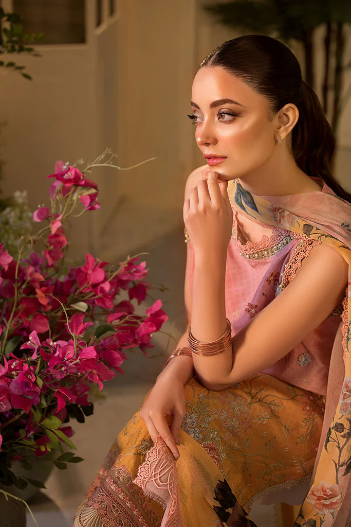 Model wearing peach and yellow embroidered dress from Sobia Nazir Vital 2025 Design 11B. Pakistani luxury pret clothes online in UK.