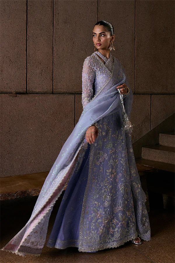Model wearing pastel mint blue embellished ensemble from Suffuse Calira, Pakistani luxury pret, shop Pakistani clothes online in UK