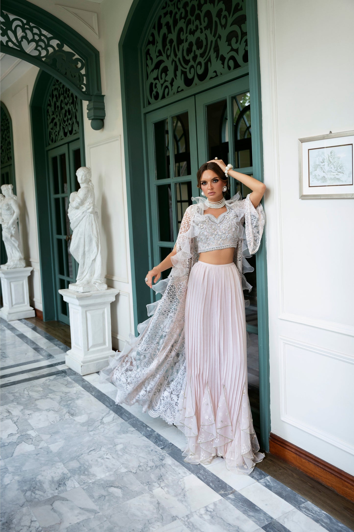 Model wearing Belisa dress from Mysie by Tahira in soft pink with intricate embellishments, perfect for Pakistani luxury pret in the UK.