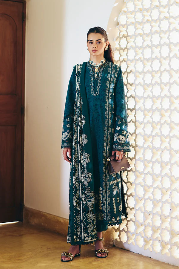 Model wearing peacock green embroidered dress from Suffuse Casual Pret 2025 Ivera. Pakistani luxury pret and Pakistani clothes online in UK.