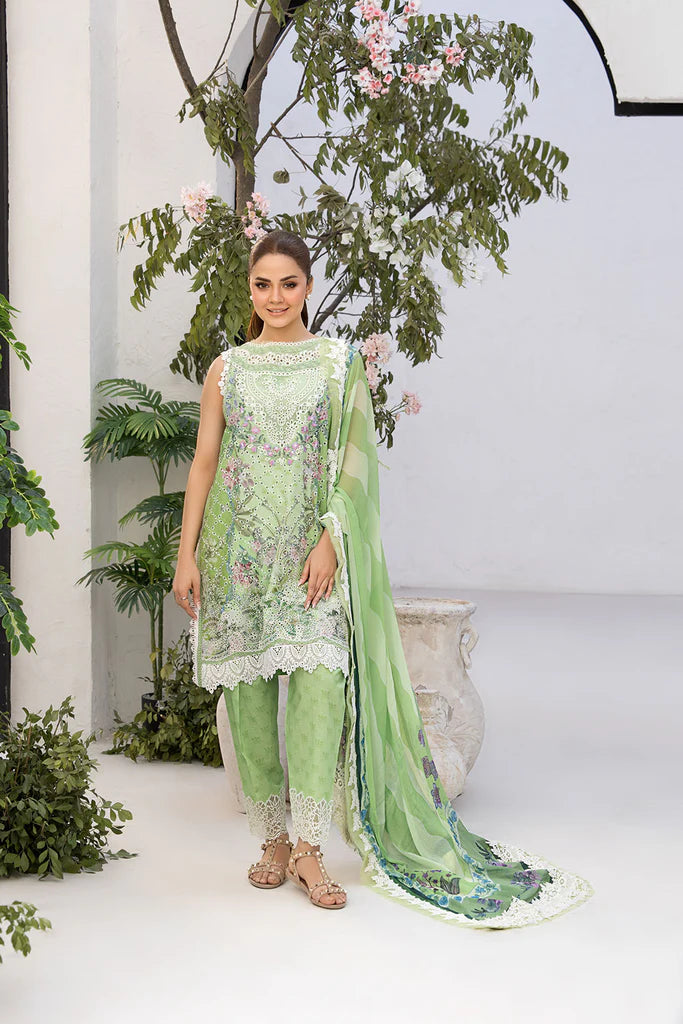Model wearing Sobia Nazir Vital 2025 Design 12A in pastel green with floral embroidery. Shop Pakistani luxury pret and Pakistani clothes online in UK.