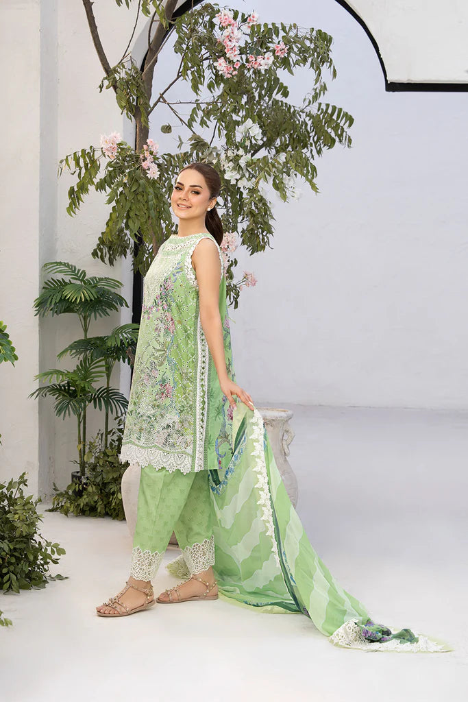 Model wearing Sobia Nazir Vital 2025 Design 12A in pastel green with floral embroidery. Shop Pakistani luxury pret and Pakistani clothes online in UK.