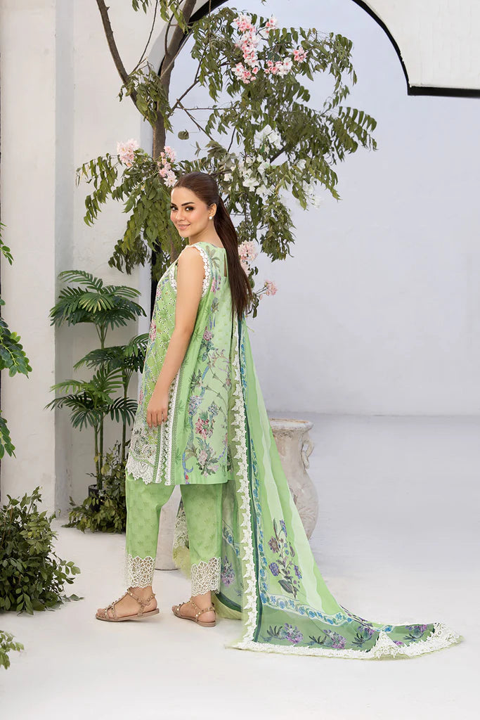 Model wearing Sobia Nazir Vital 2025 Design 12A in pastel green with floral embroidery. Shop Pakistani luxury pret and Pakistani clothes online in UK.