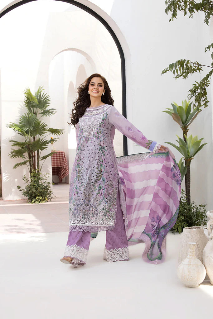 Model wearing Sobia Nazir Vital 2025 Design 12B in soft lavender with eyelet embroidery. Shop Pakistani luxury pret clothes online in UK.