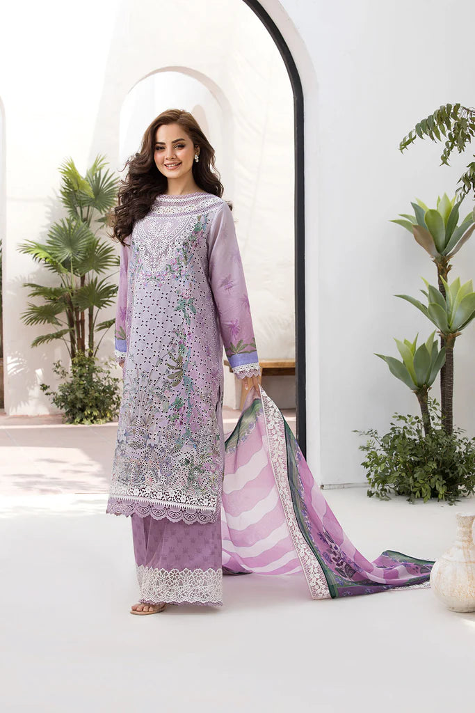 Model wearing Sobia Nazir Vital 2025 Design 12B in soft lavender with eyelet embroidery. Shop Pakistani luxury pret clothes online in UK.