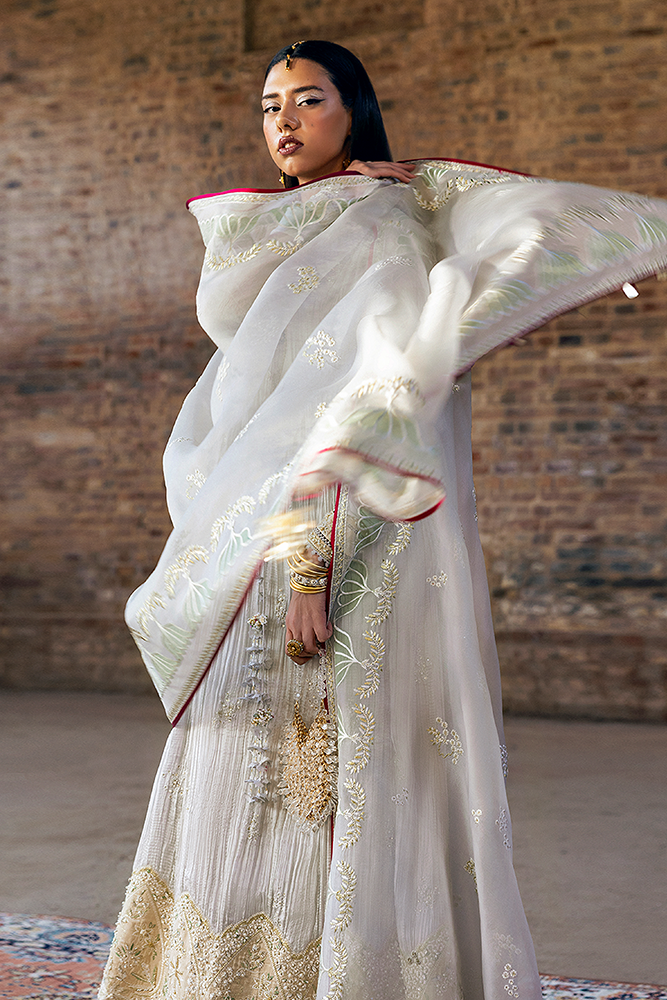 Model wearing NEVE, back view, a Pakistani designer outfit by Suffuse, available online in the UK.