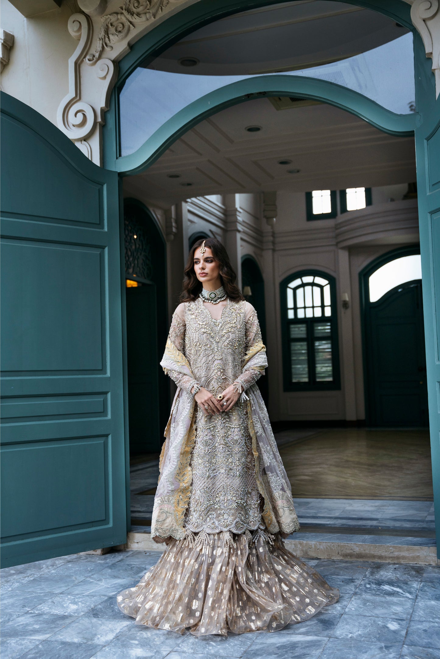 Model wearing PEONY from Mysie by Tahira, a soft beige and gold embellished ensemble, perfect for Pakistani luxury pret in the UK.