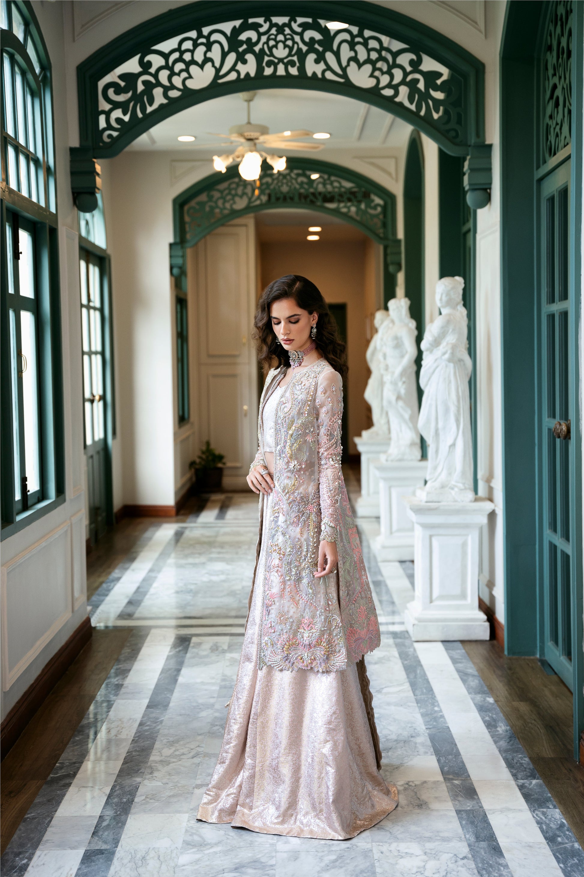 Model wearing Arsh from Mysie by Tahira, a stunning beige luxury pret outfit with intricate embroidery, perfect for Pakistani clothes in the UK.