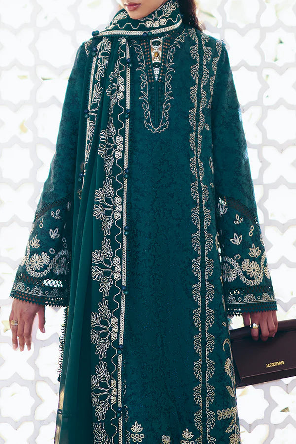Model wearing peacock green embroidered dress from Suffuse Casual Pret 2025 Ivera. Pakistani luxury pret and Pakistani clothes online in UK.