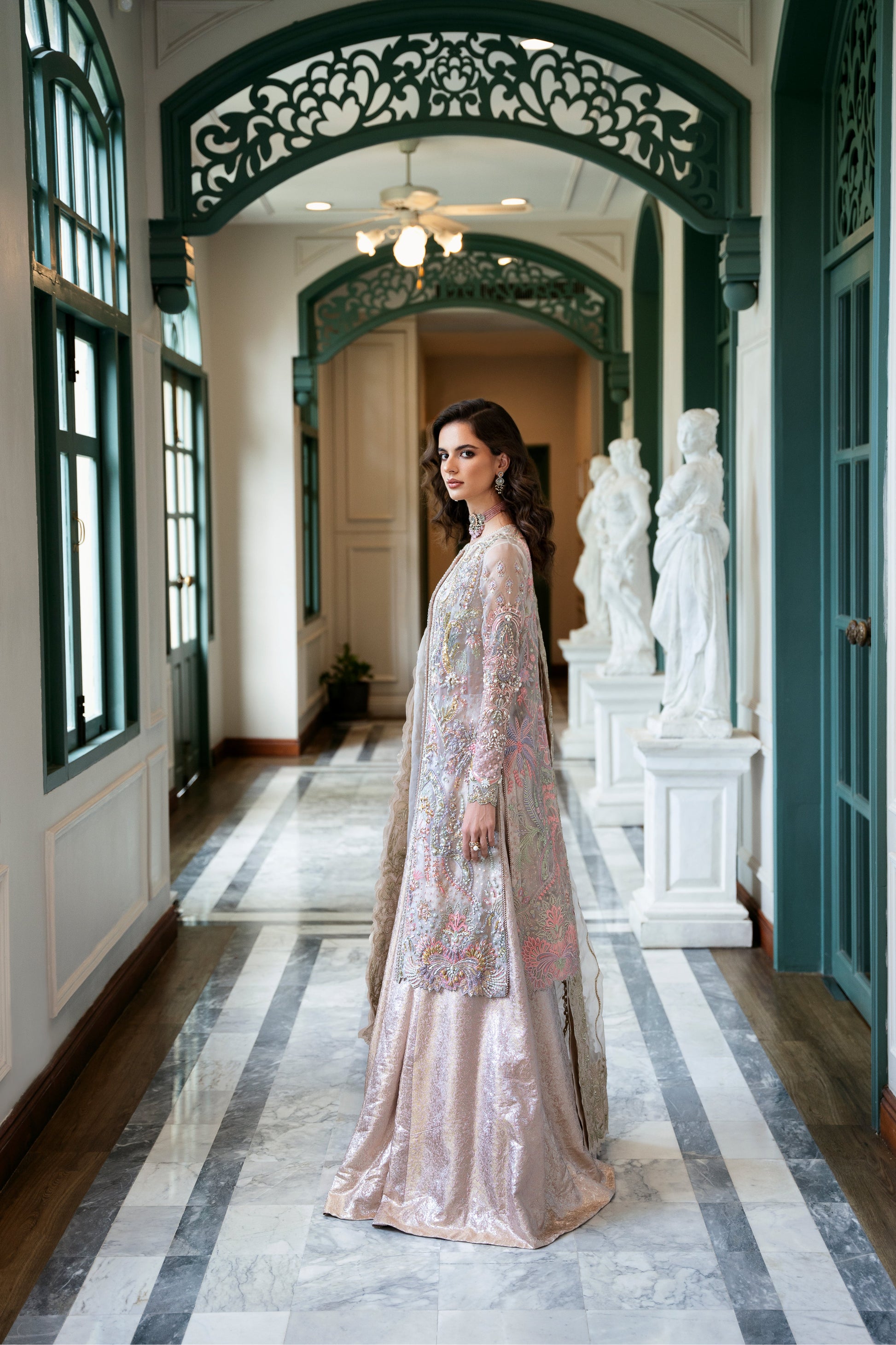 Model wearing Arsh from Mysie by Tahira, a stunning beige luxury pret outfit with intricate embroidery, perfect for Pakistani clothes in the UK.