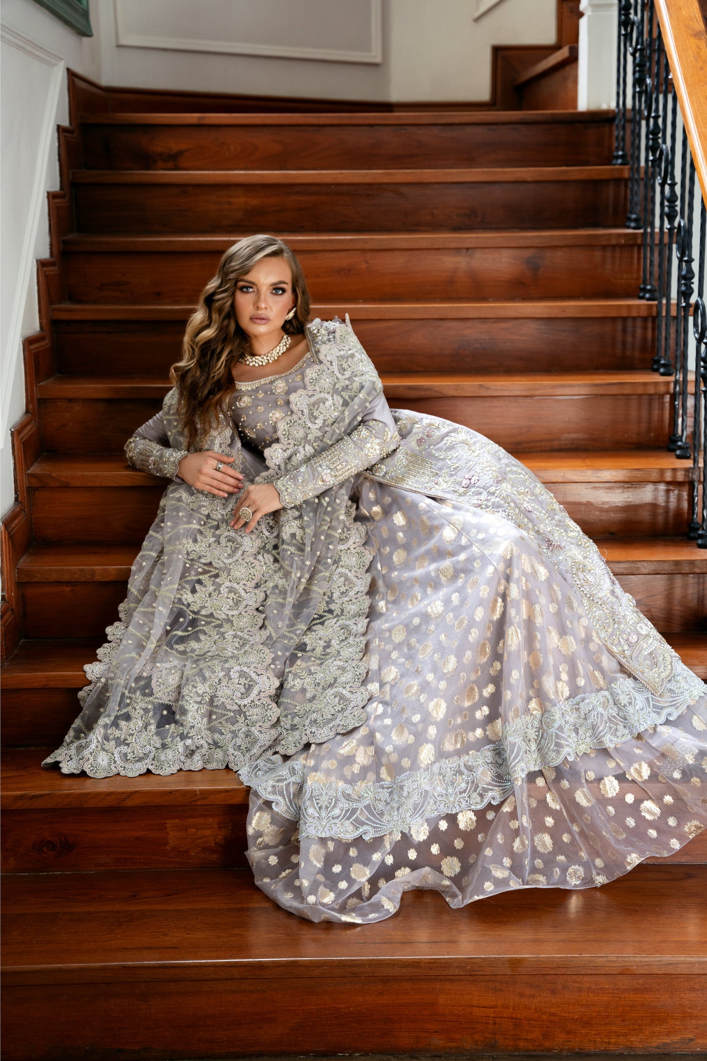 Model wearing Lotus from Mysie by Tahira, a luxurious grey embellished lehenga choli perfect for Pakistani luxury pret in the UK.