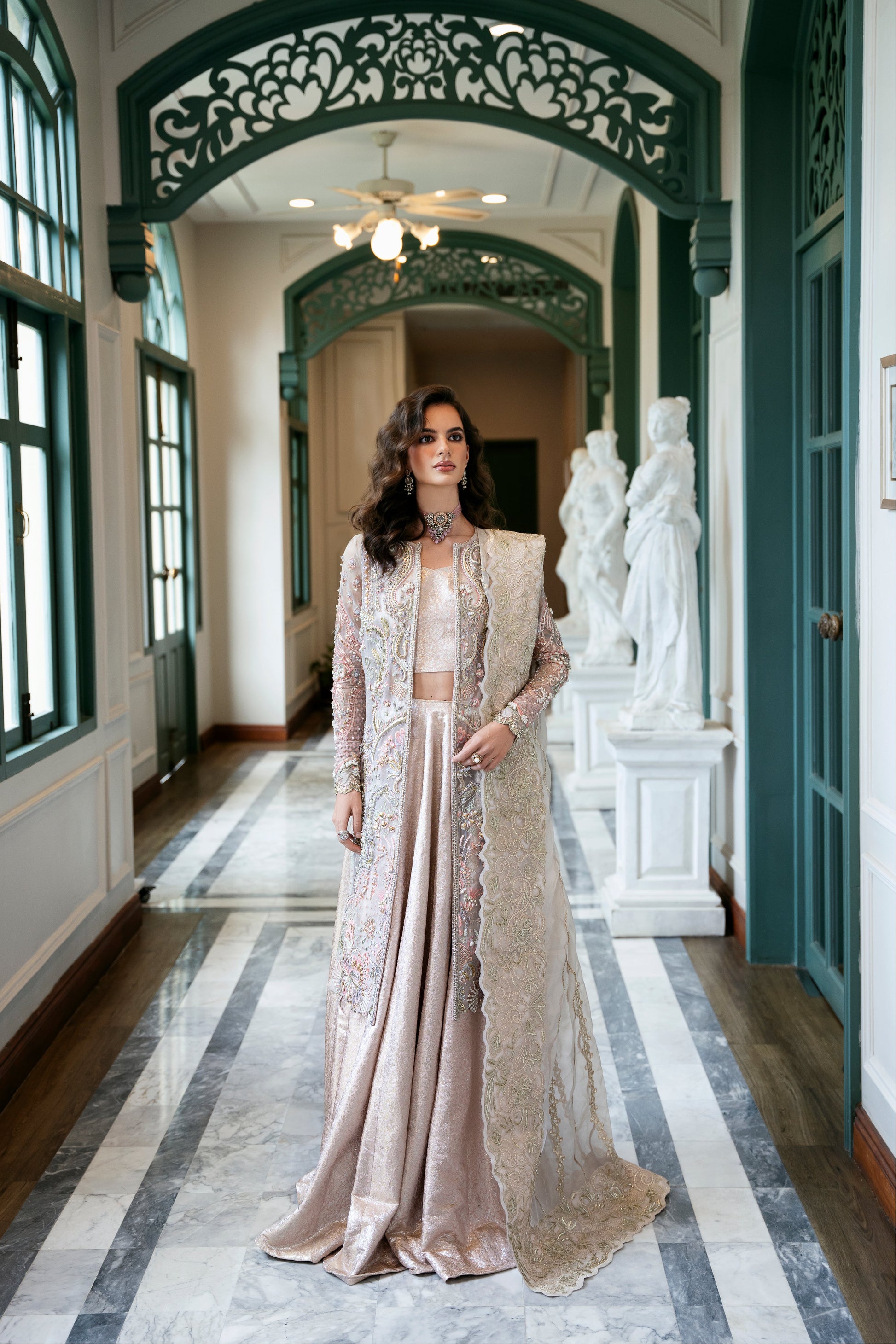 Model wearing Arsh from Mysie by Tahira, a stunning beige luxury pret outfit with intricate embroidery, perfect for Pakistani clothes in the UK.