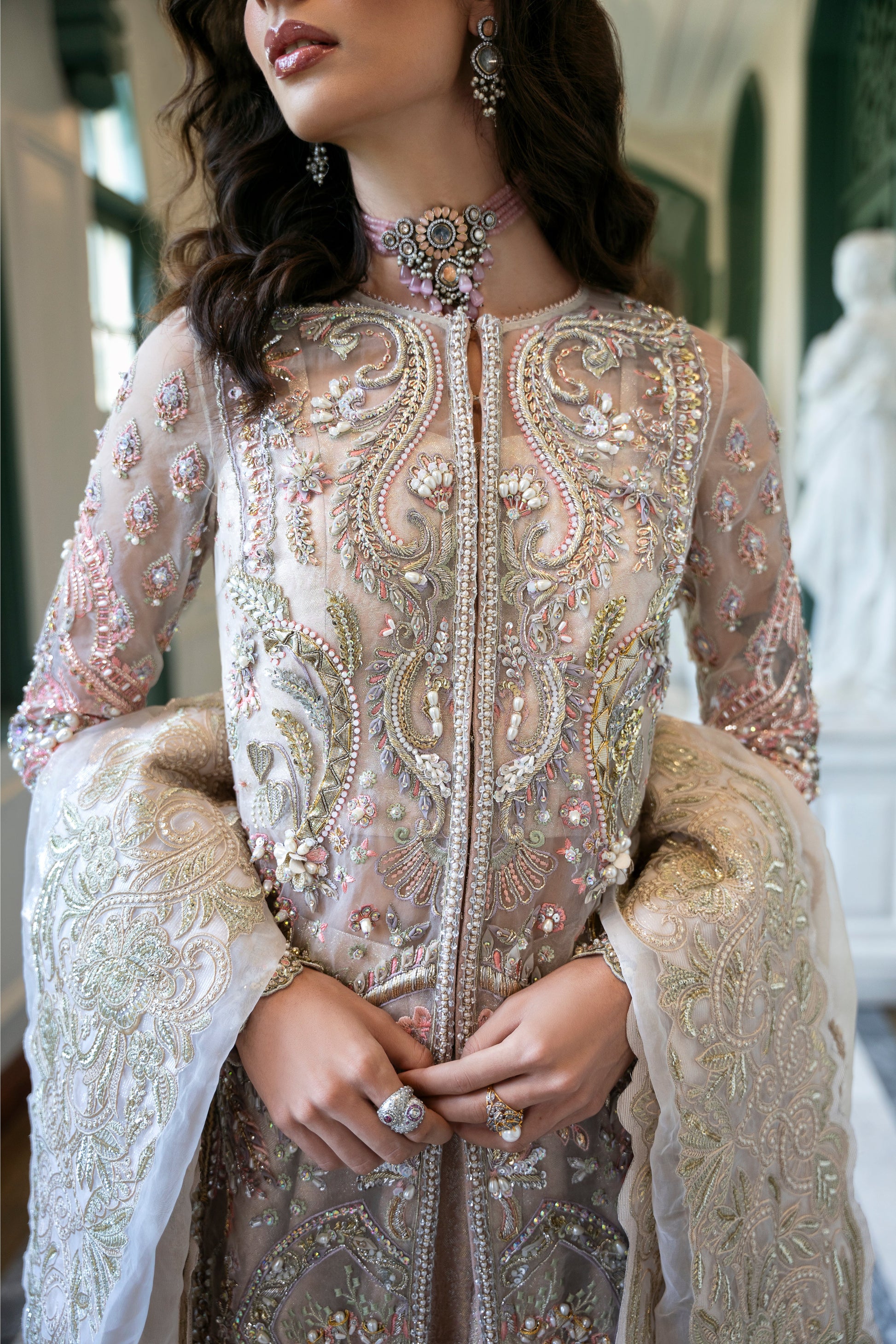Model wearing Arsh from Mysie by Tahira, a stunning beige luxury pret outfit with intricate embroidery, perfect for Pakistani clothes in the UK.