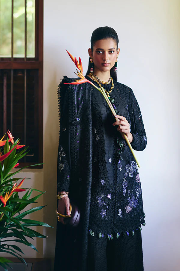 Model wearing black embroidered dress from Suffuse Casual Pret 2025 Leyla. Pakistani luxury pret and Pakistani clothes online in UK.