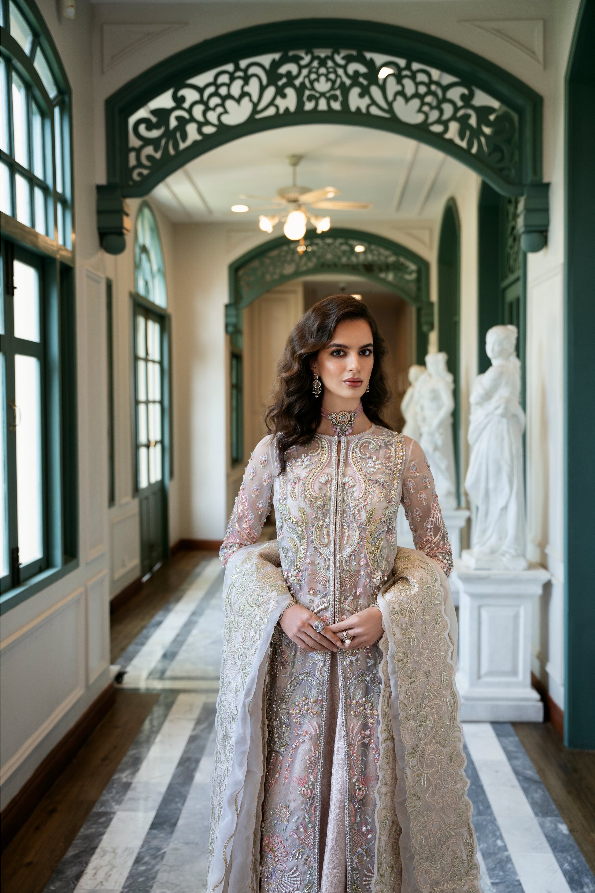Model wearing Arsh from Mysie by Tahira, a stunning beige luxury pret outfit with intricate embroidery, perfect for Pakistani clothes in the UK.
