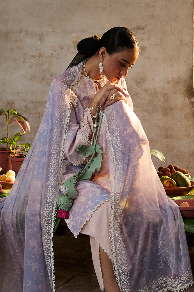 Model wearing Eeshar by Suffuse in pastel lilac and blue with delicate embroidery – elegant Pakistani luxury pret outfit in UK.