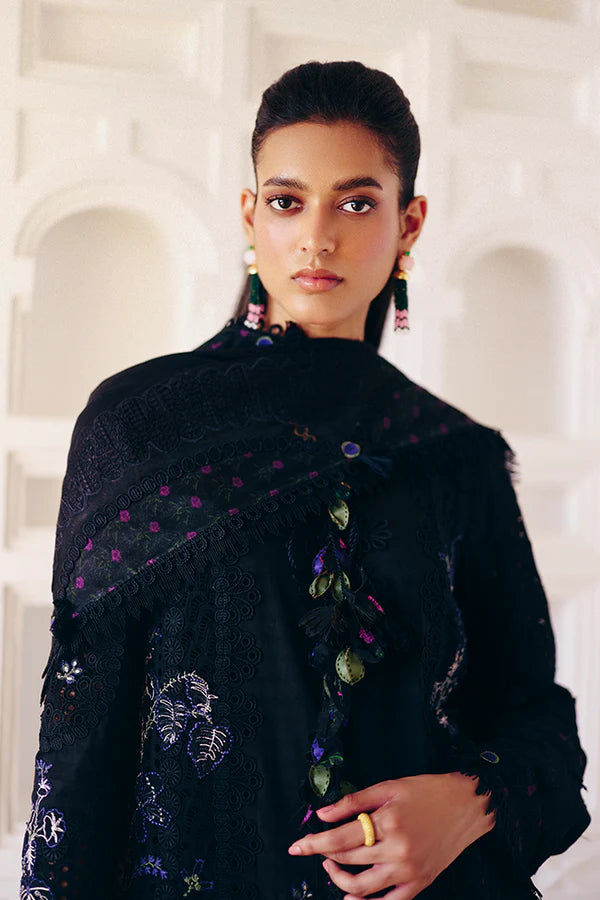 Model wearing black embroidered dress from Suffuse Casual Pret 2025 Leyla. Pakistani luxury pret and Pakistani clothes online in UK.