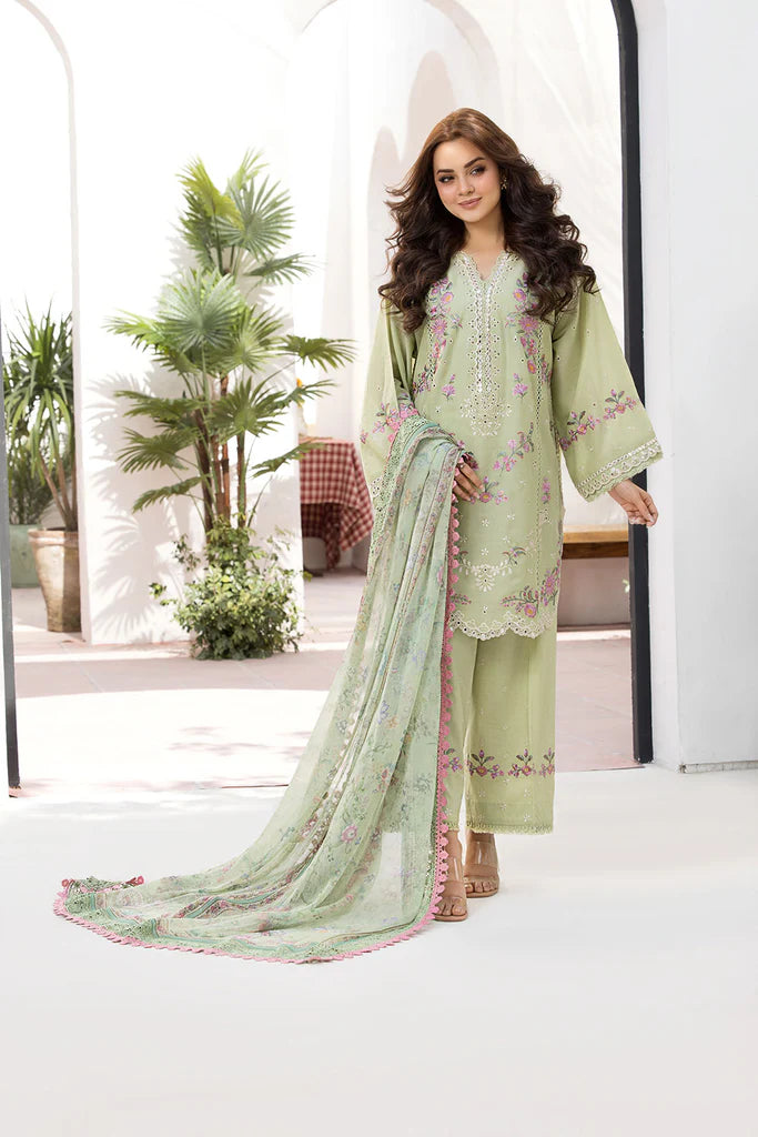 Model wearing Sobia Nazir Vital 2025 Design 1A in pastel green with floral embroidery. Shop Pakistani luxury pret clothes online in UK.