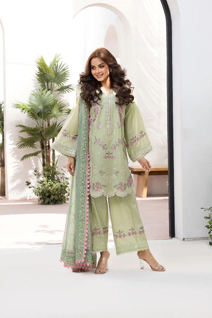 Model wearing Sobia Nazir Vital 2025 Design 1A in pastel green with floral embroidery. Shop Pakistani luxury pret clothes online in UK.