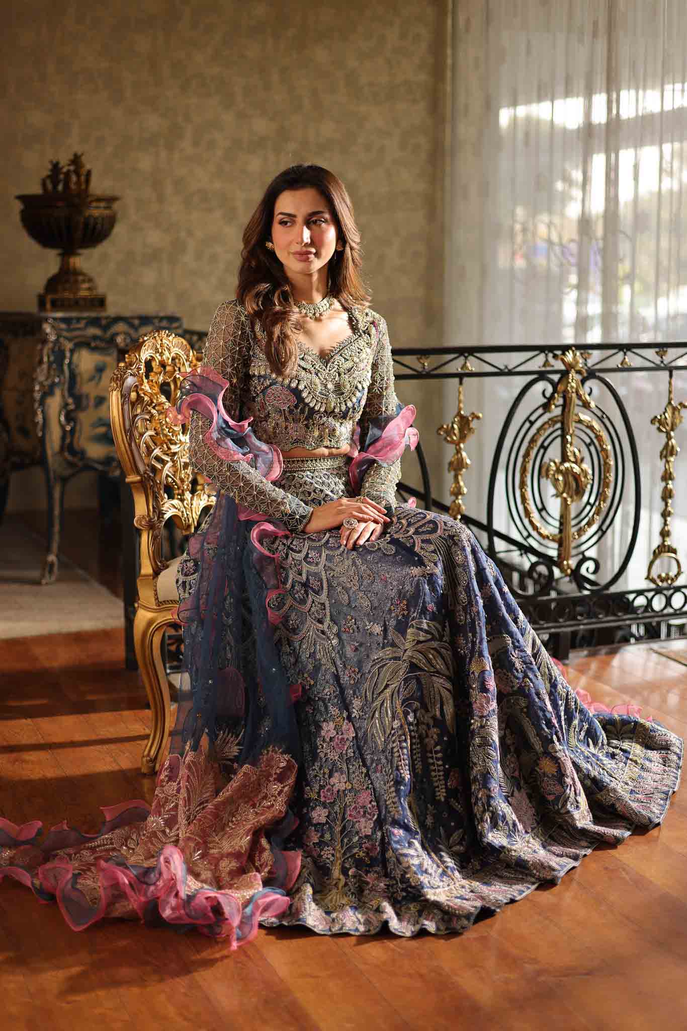 Model wearing blue and pink embellished lehenga choli Stella from Mysie By Tahira Wedding Edits '25, Pakistani luxury pret online in UK.