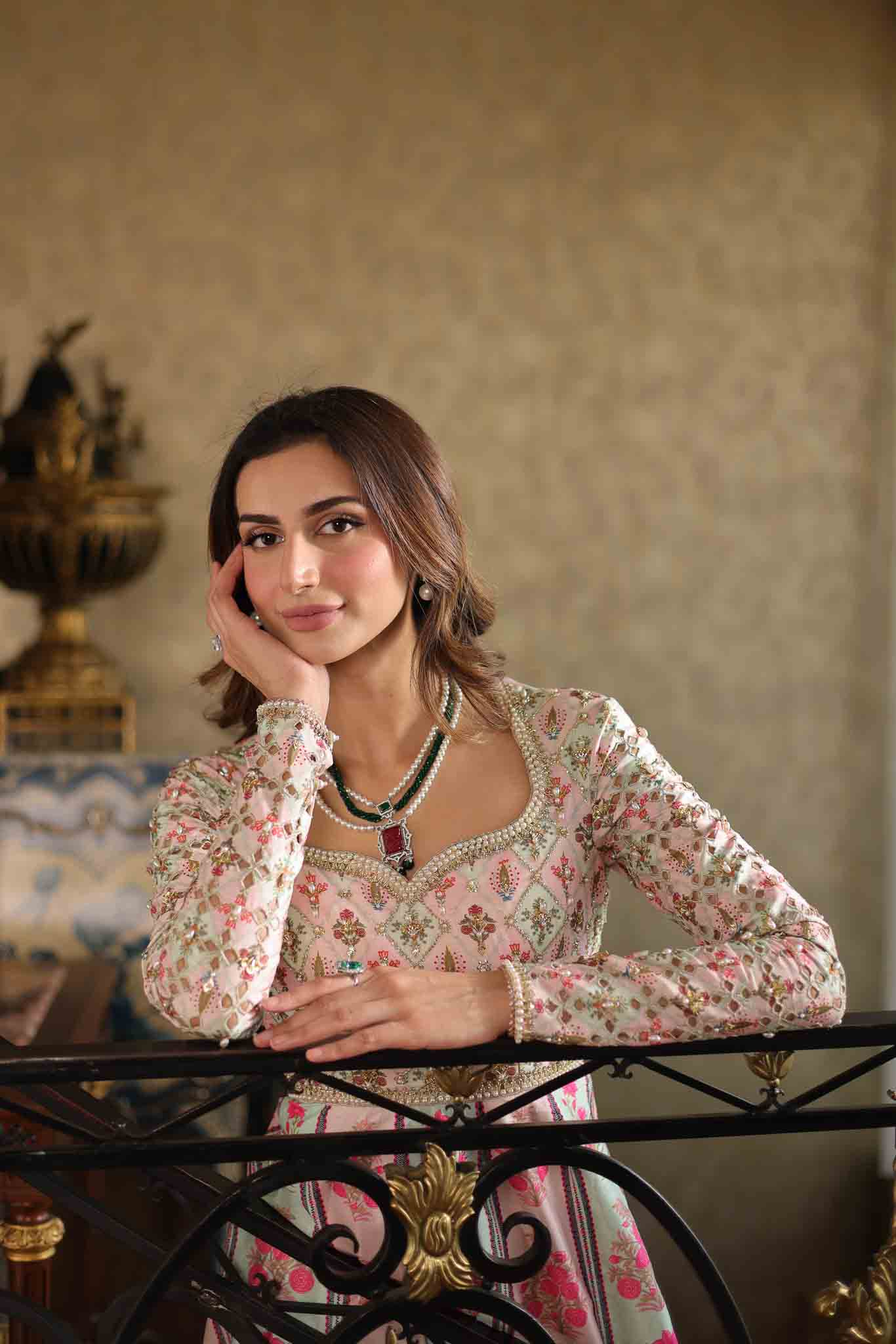 Model wearing pastel pink and ivory floral printed long dress from Mysie By Tahira's Gulabo, Pakistani Luxury pret and clothes online in UK.