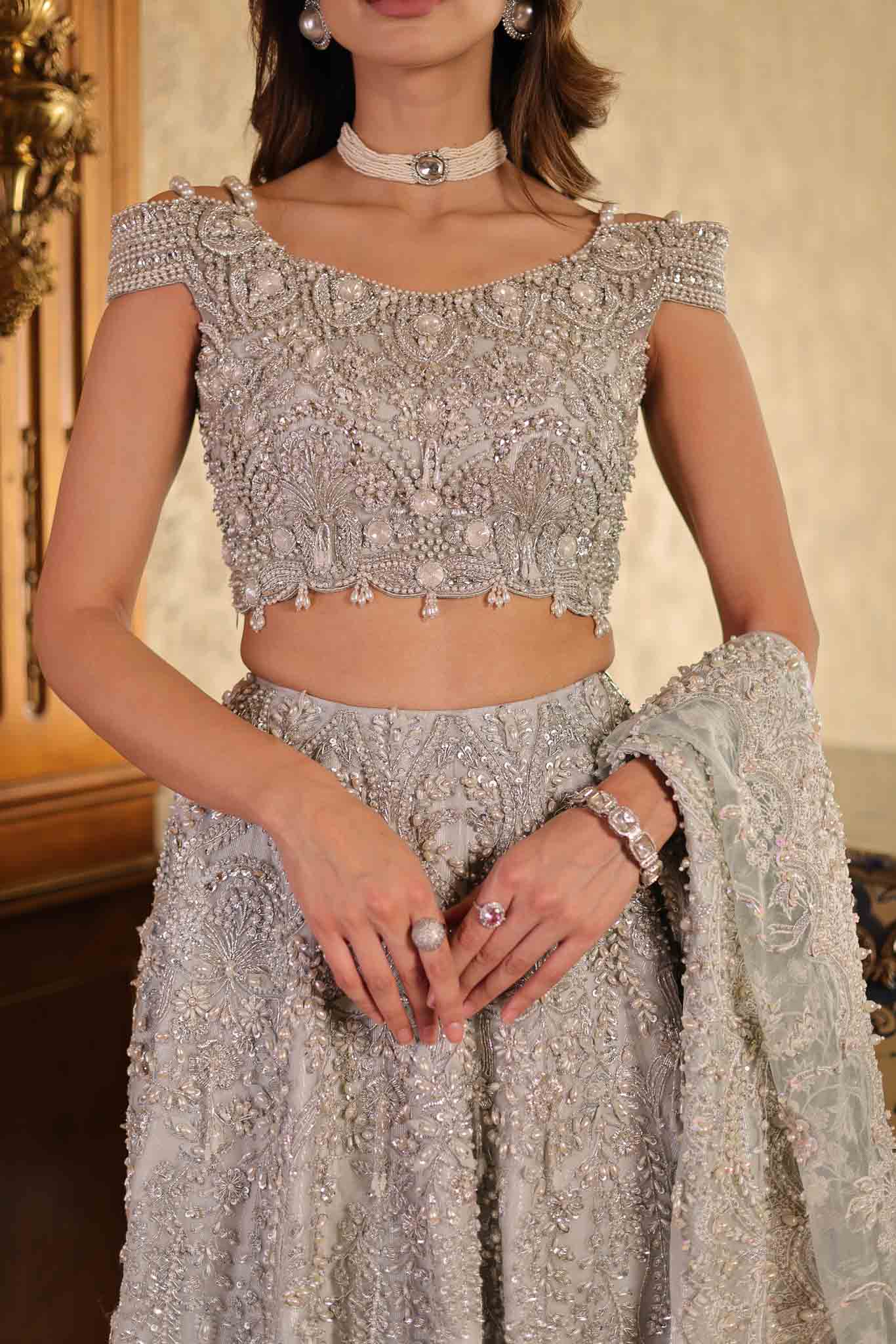 Model wearing silver embellished formal dress from Mysie By Tahira's Mia, Pakistani Luxury pret available online in UK.