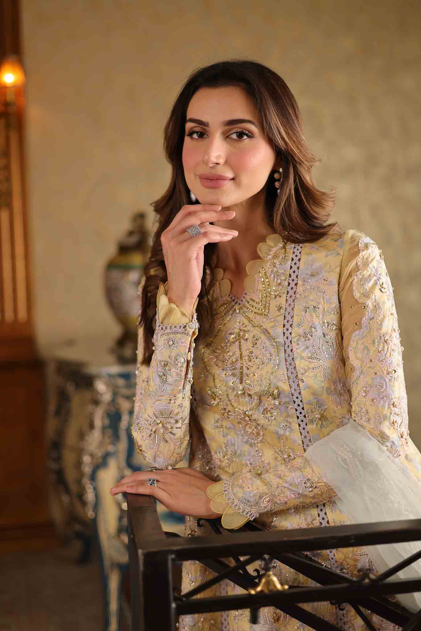 Model wearing pastel yellow embroidered long shirt with ivory dupatta from Mysie By Tahira's Tulip, Pakistani Luxury pret in UK.