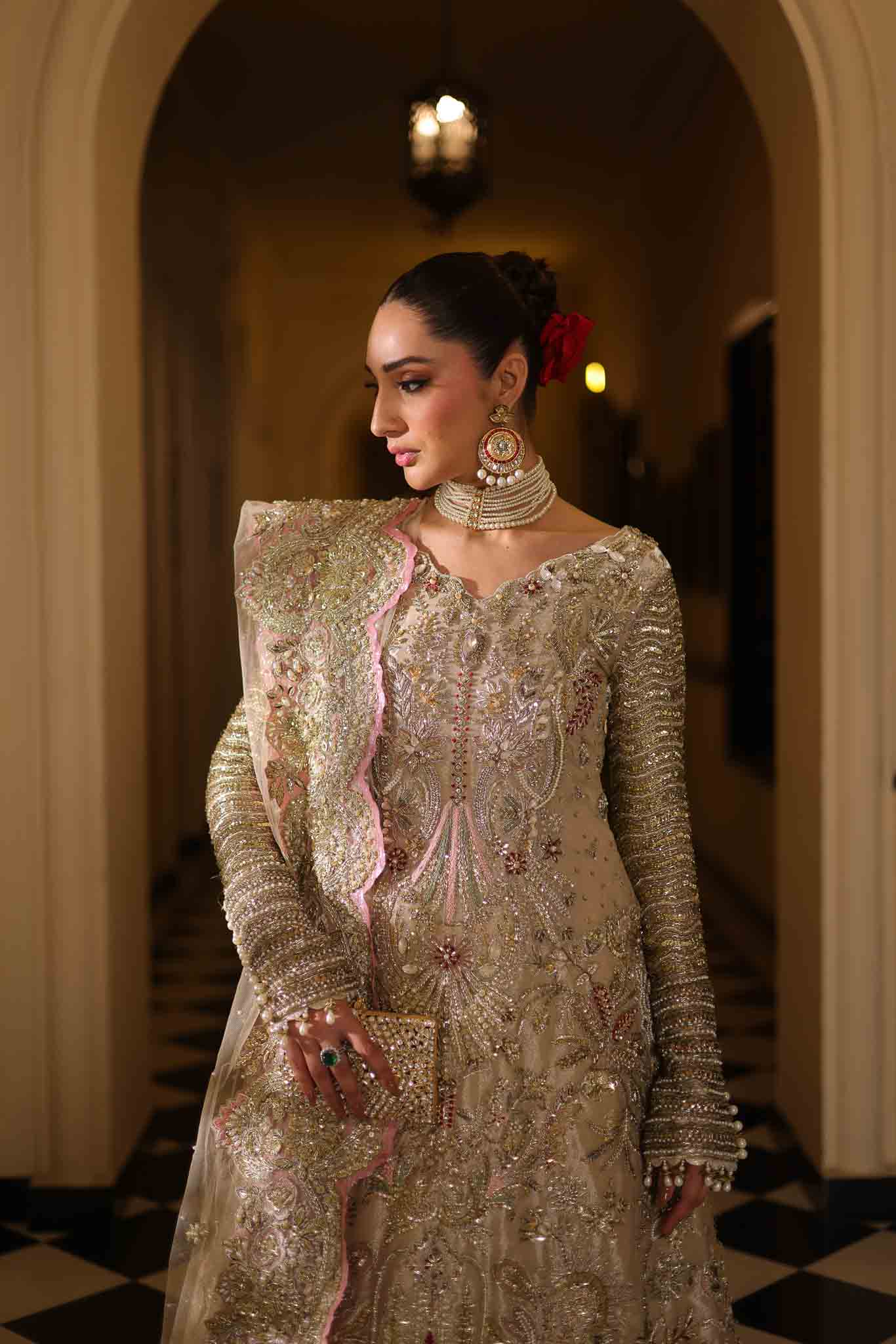 Model wearing champagne gold dress LILA from Mysie by Tahira, intricately embellished Pakistani luxury pret available online in UK.