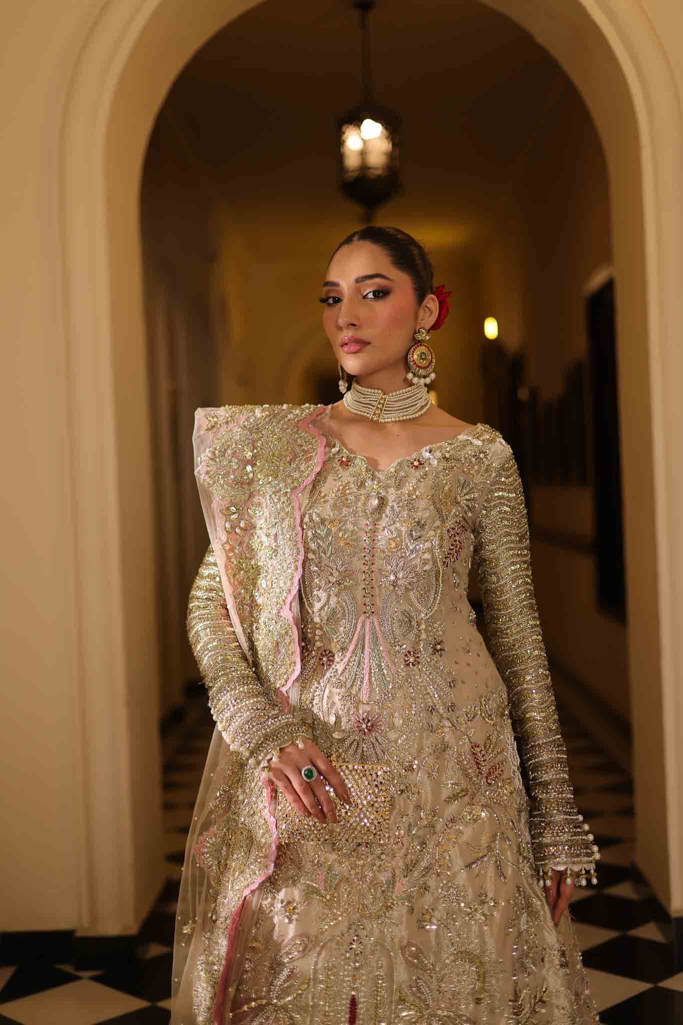 Model wearing champagne gold dress LILA from Mysie by Tahira, intricately embellished Pakistani luxury pret available online in UK.