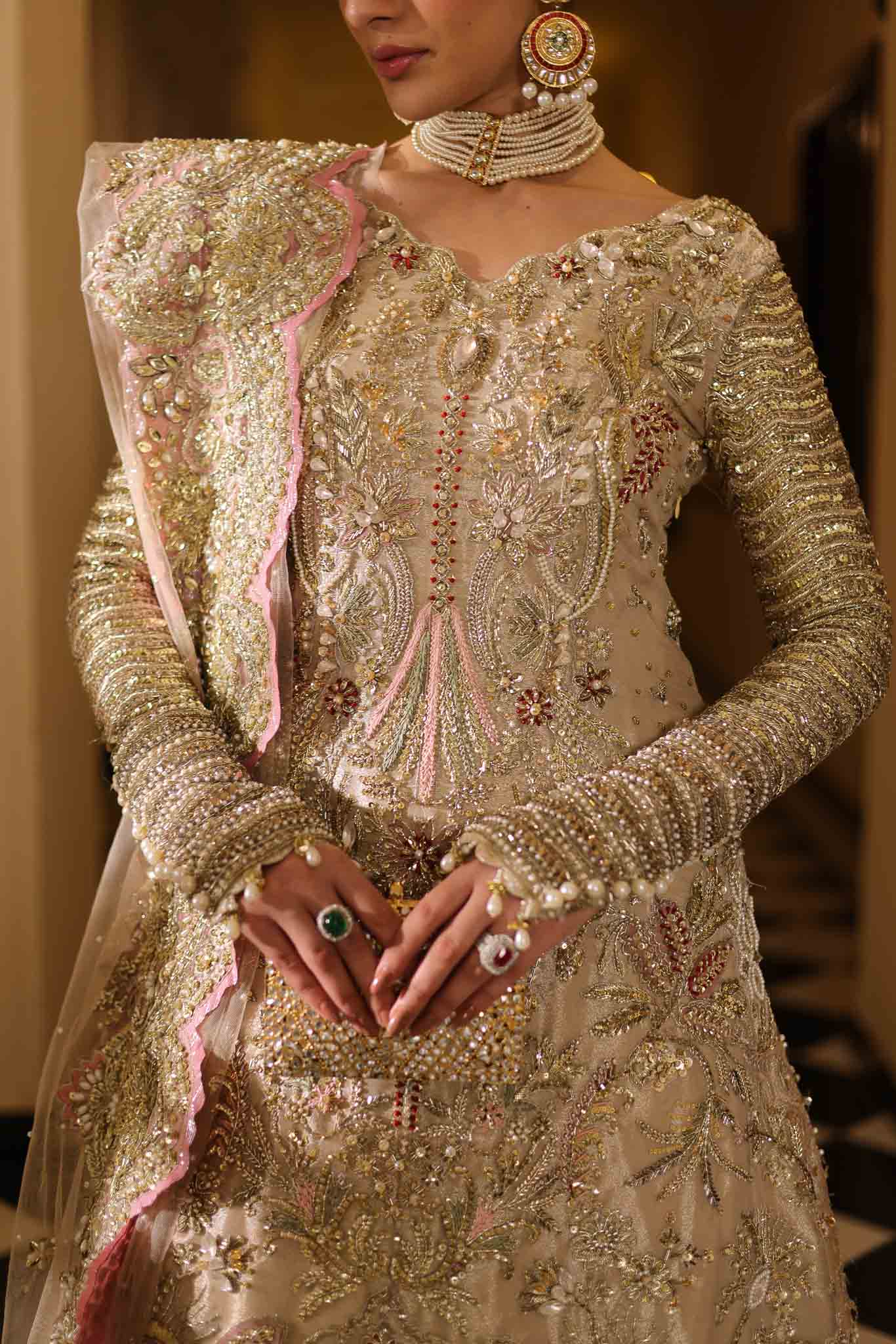 Model wearing champagne gold dress LILA from Mysie by Tahira, intricately embellished Pakistani luxury pret available online in UK.