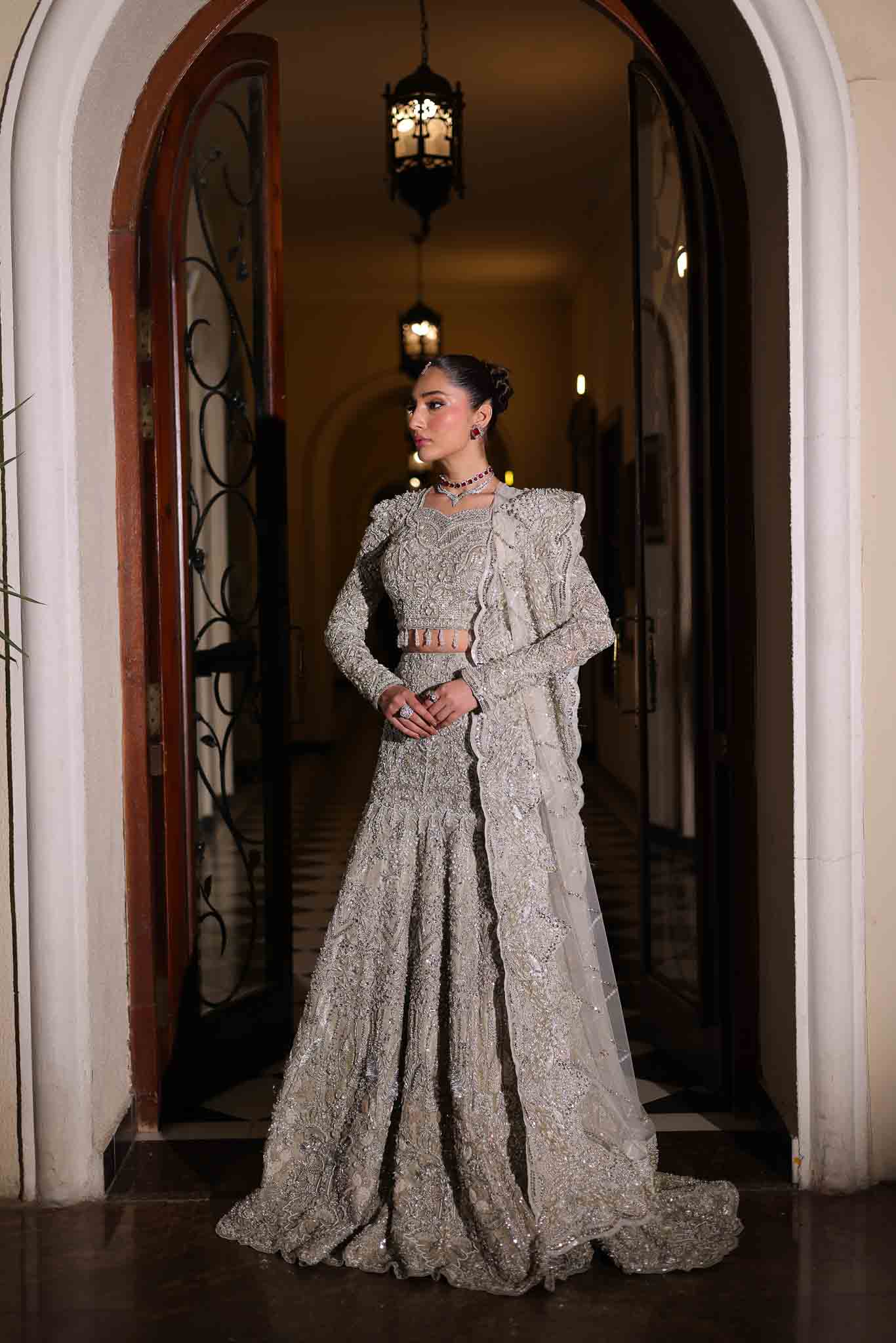 Model wearing silver embellished dress BIA from Mysie by Tahira, showcasing Pakistani luxury pret available online in UK.