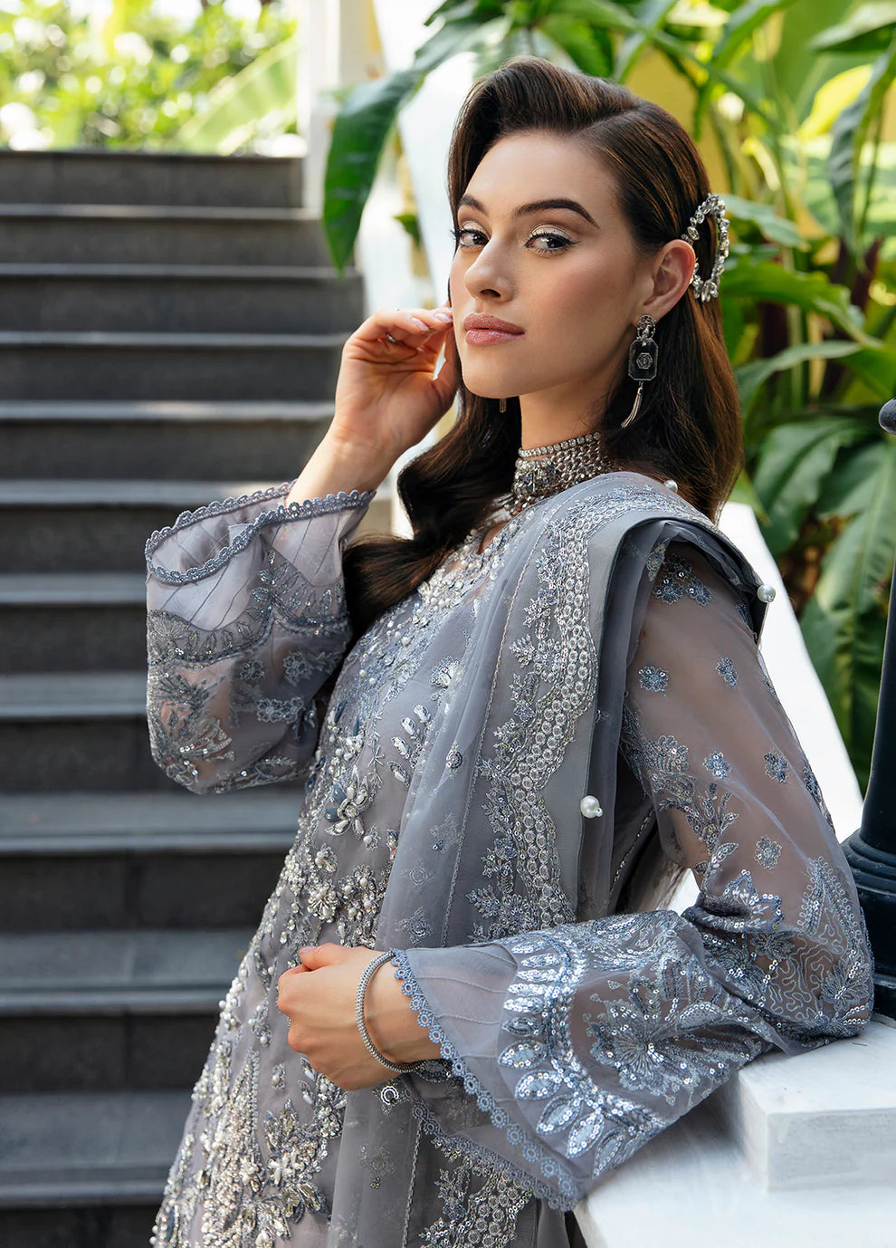 Model wearing Gulaal AVIANA grey embroidered dress, UK Pakistani luxury fashion.