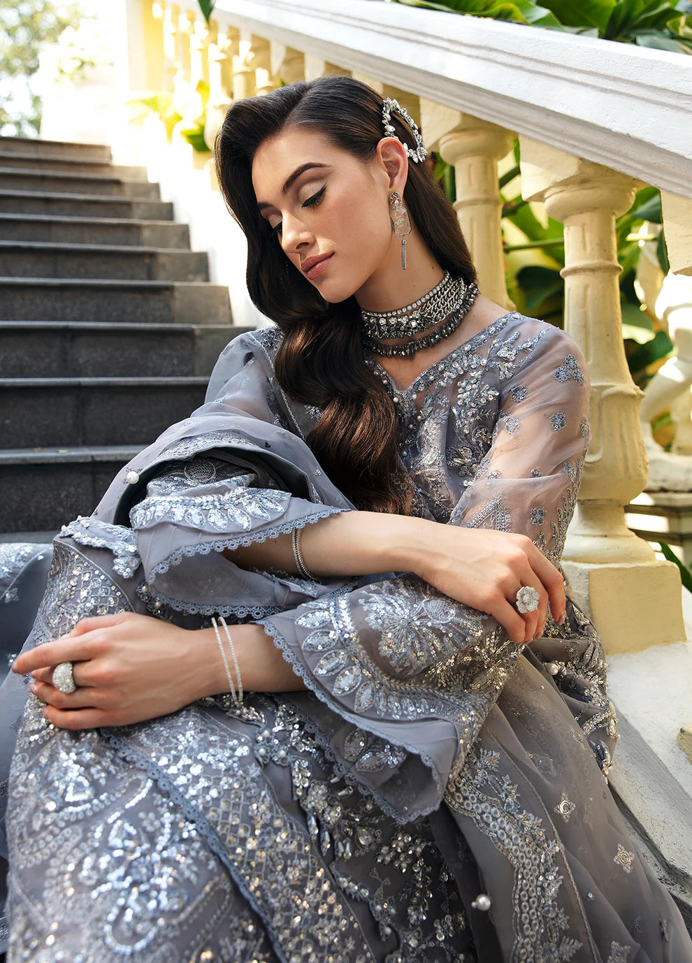 Model wearing Gulaal AVIANA grey embroidered dress, UK Pakistani luxury fashion.