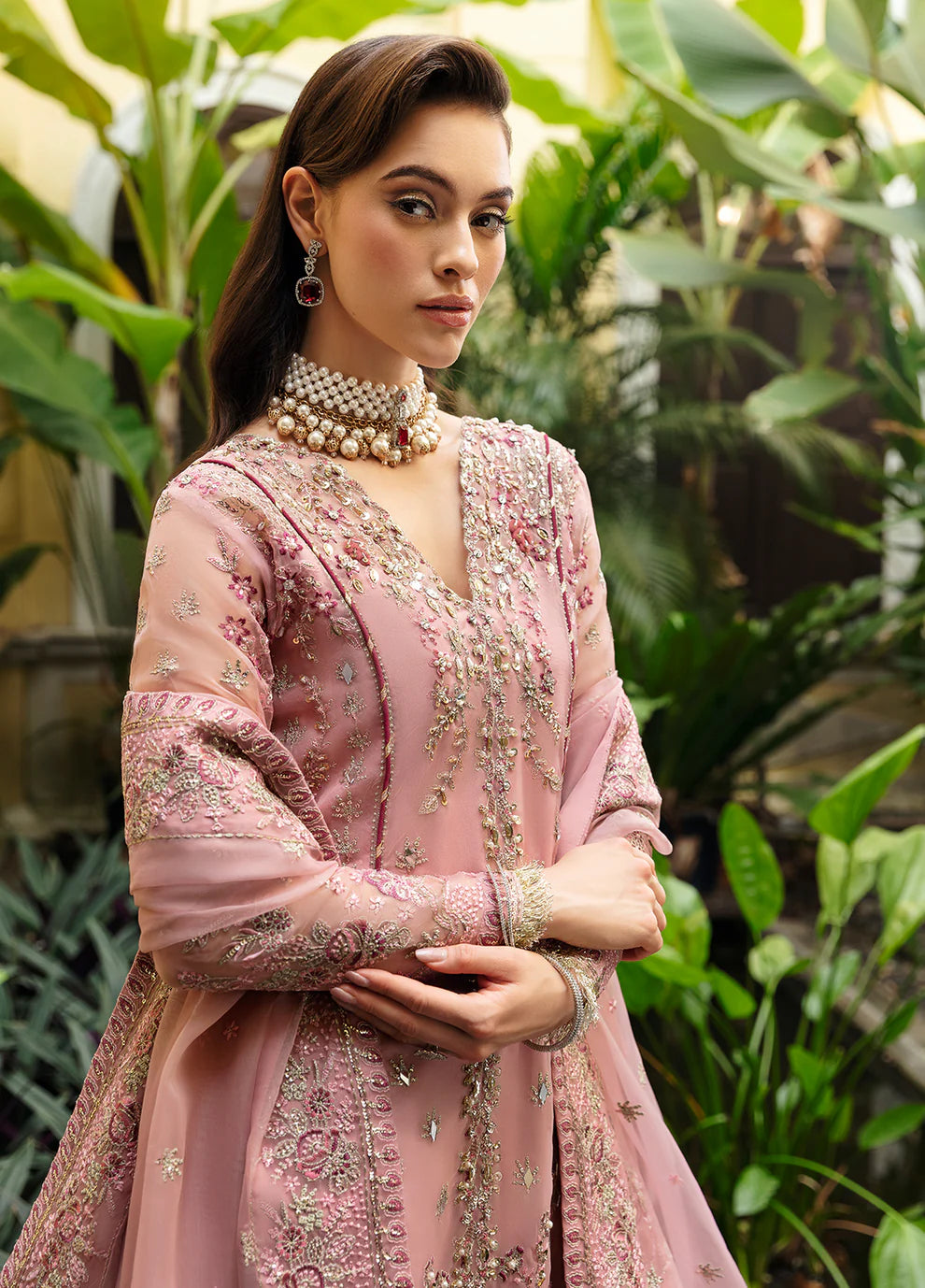 Model wearing Gulaal Luxury Pret pink EVOLETTE dress, elegant Pakistani clothes UK.