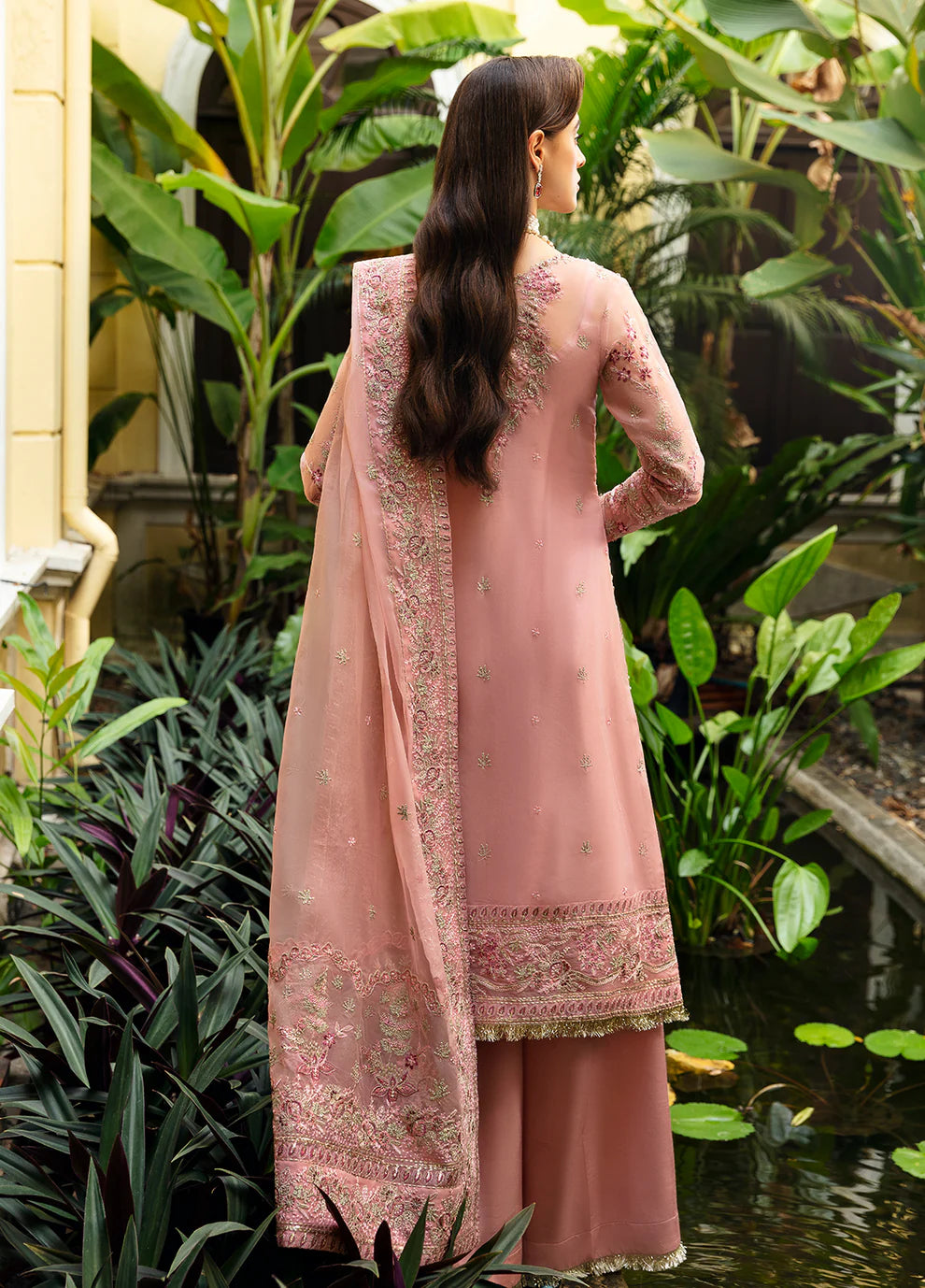 Model wearing Gulaal Luxury Pret pink EVOLETTE dress, elegant Pakistani clothes UK.