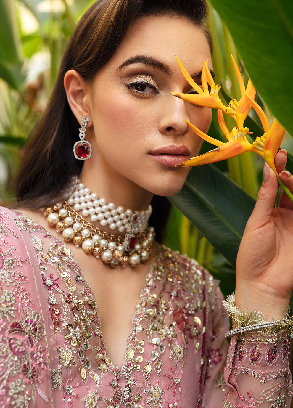 Model wearing Gulaal Luxury Pret pink EVOLETTE dress, elegant Pakistani clothes UK.