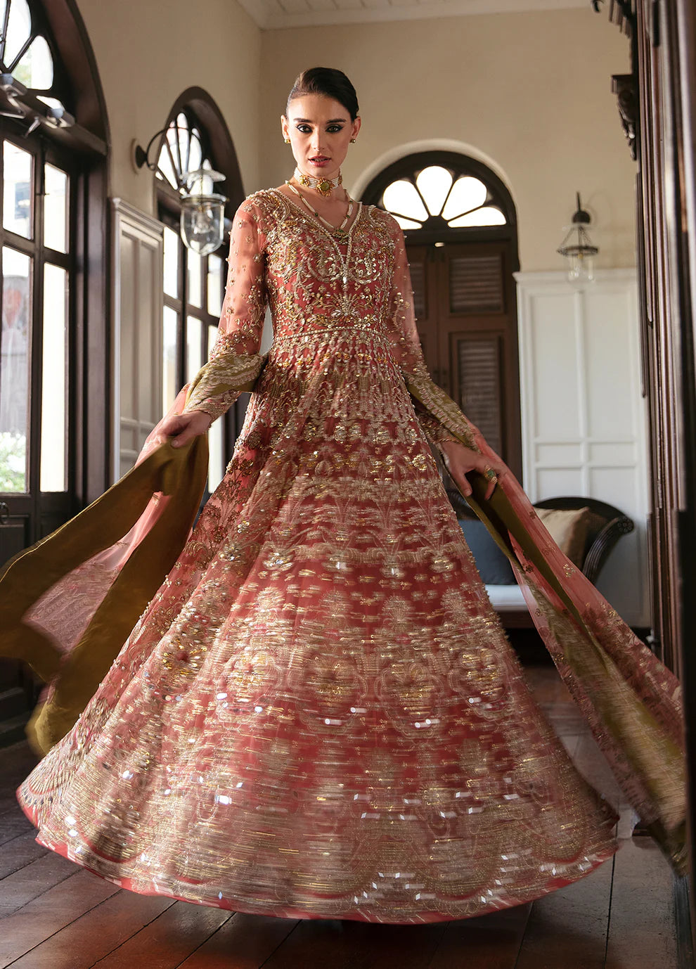 Model wearing Gulaal MARYSE peach and maroon embellished dress, UK Pakistani designer wear.