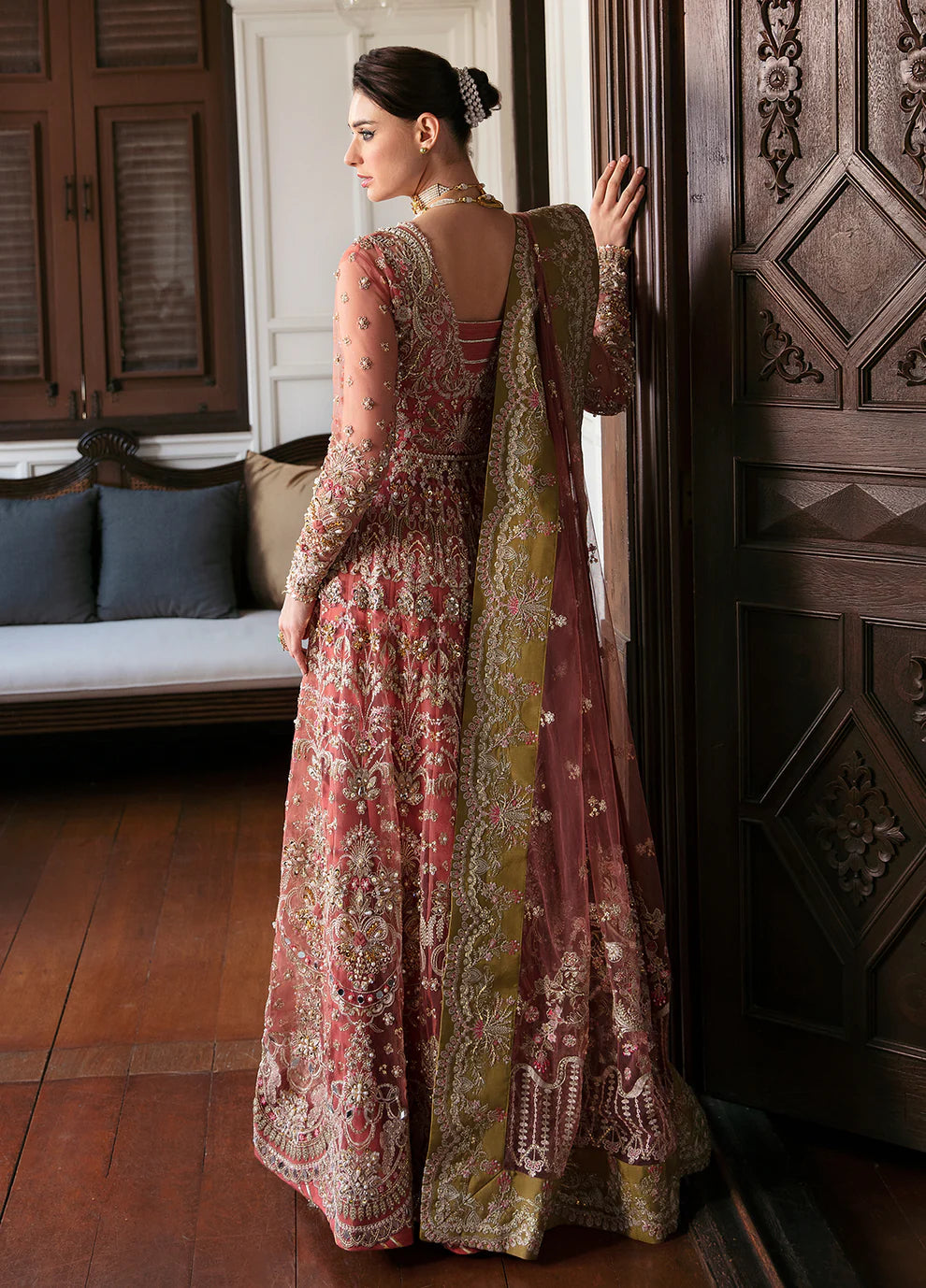 Model wearing Gulaal MARYSE peach and maroon embellished dress, UK Pakistani designer wear.