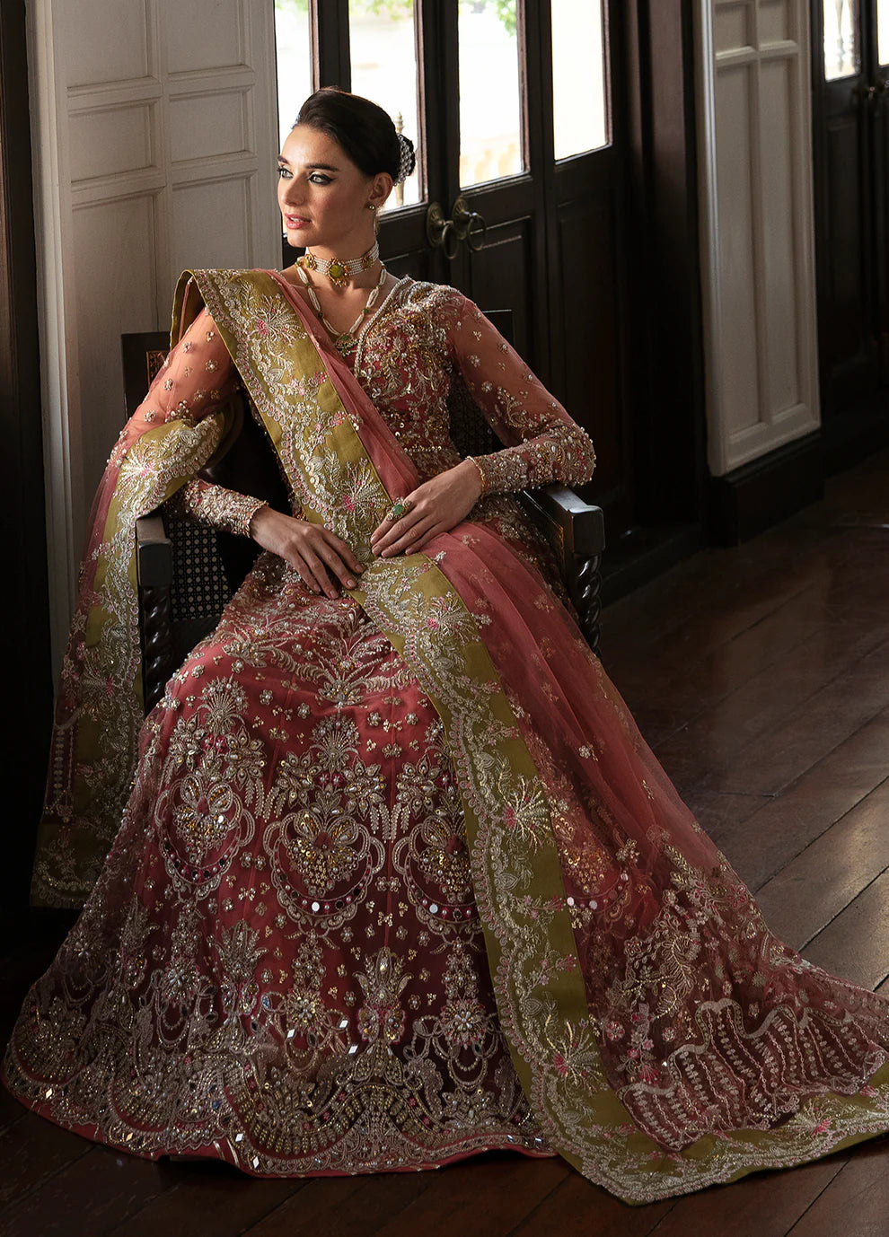 Model wearing Gulaal MARYSE peach and maroon embellished dress, UK Pakistani designer wear.