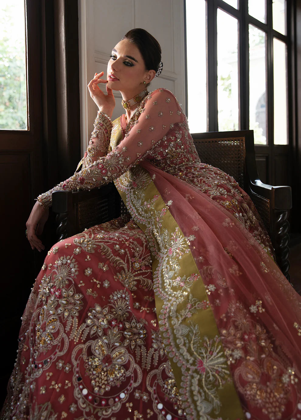 Model wearing Gulaal MARYSE peach and maroon embellished dress, UK Pakistani designer wear.