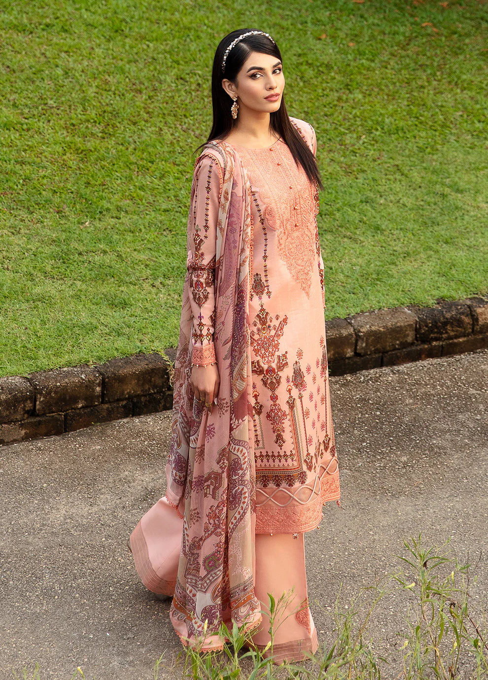 Model wearing elegant peach HESTIA GL-L-24V1-12 dress from Gulaal's Spring Ballet 2024 collection, showcasing Pakistani clothes online in the UK.