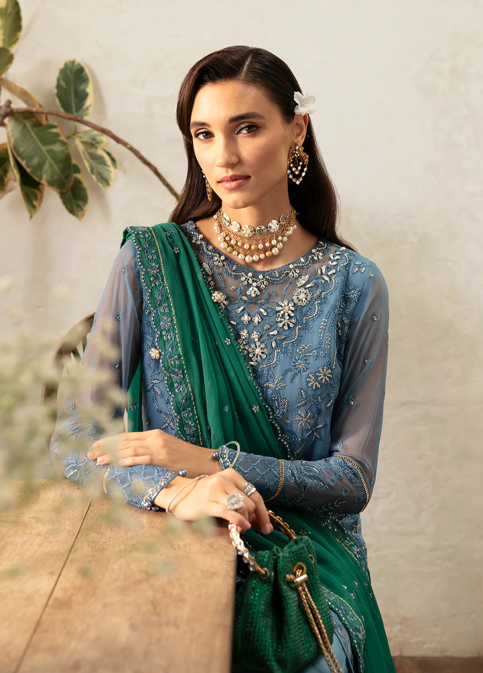Model wearing Gulaal Helia blue chiffon Eid dress, Suffuse embroidery, Pakistani clothes UK.