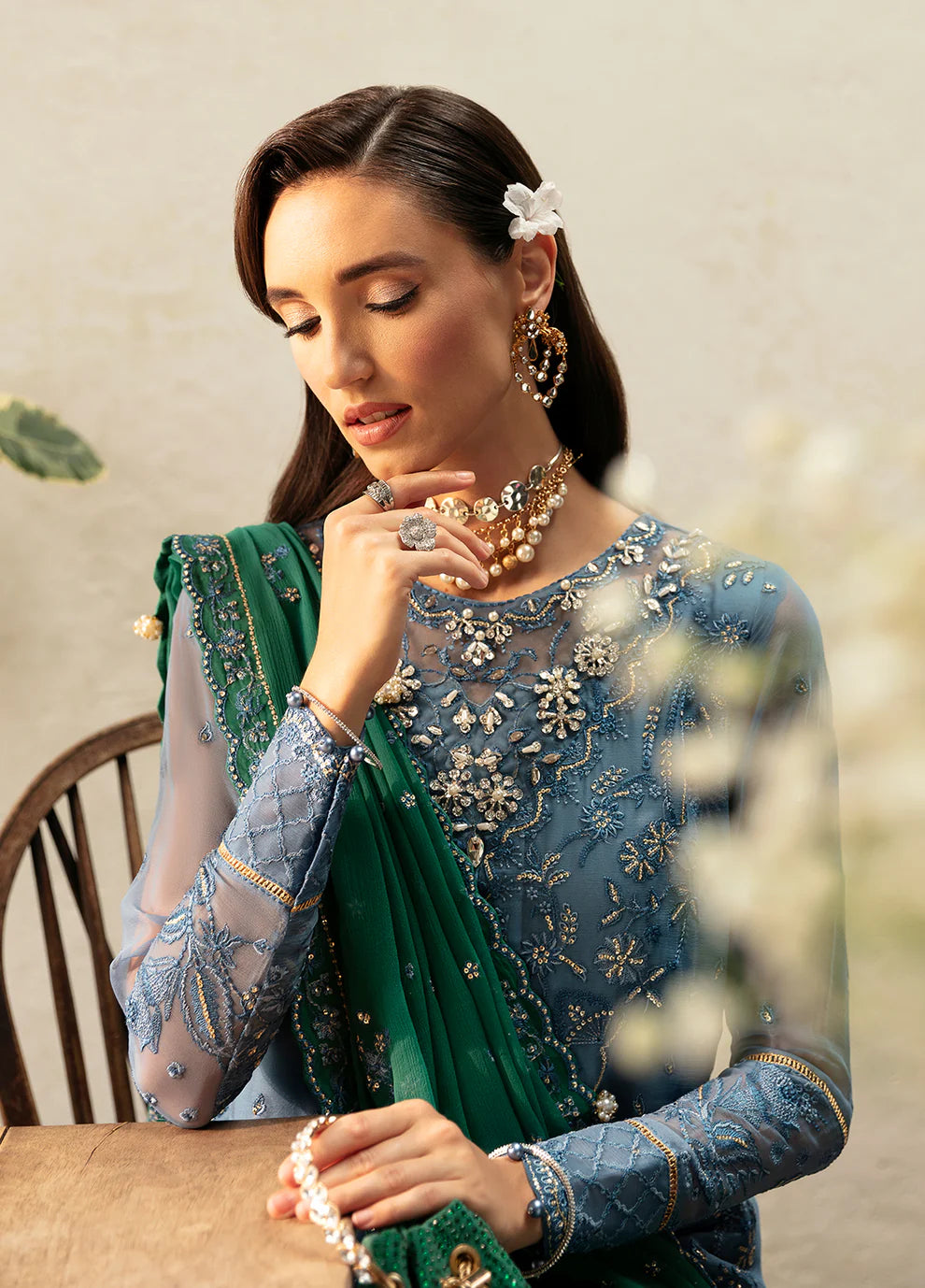 Model wearing Gulaal Helia blue chiffon Eid dress, Suffuse embroidery, Pakistani clothes UK.