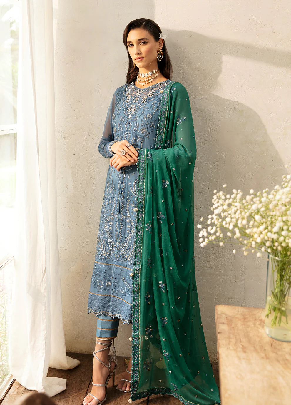 Model wearing Gulaal Helia blue chiffon Eid dress, Suffuse embroidery, Pakistani clothes UK.