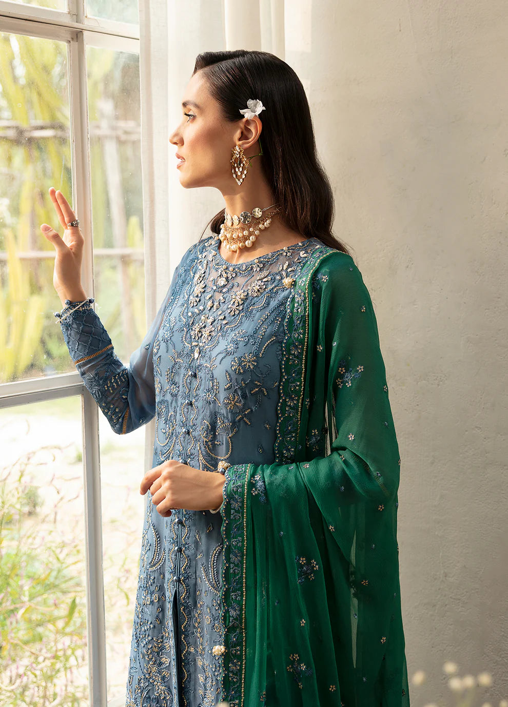 Model wearing Gulaal Helia blue chiffon Eid dress, Suffuse embroidery, Pakistani clothes UK.