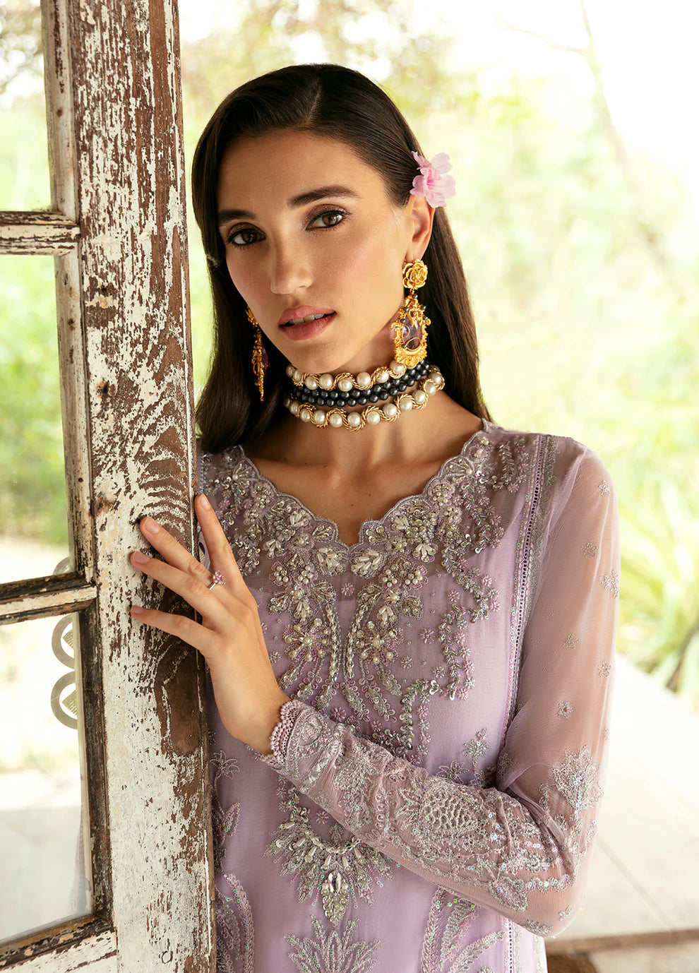 Model wearing Gulaal Viola lavender embroidered Eid dress, Suffuse accents, luxe Pakistani clothes UK.