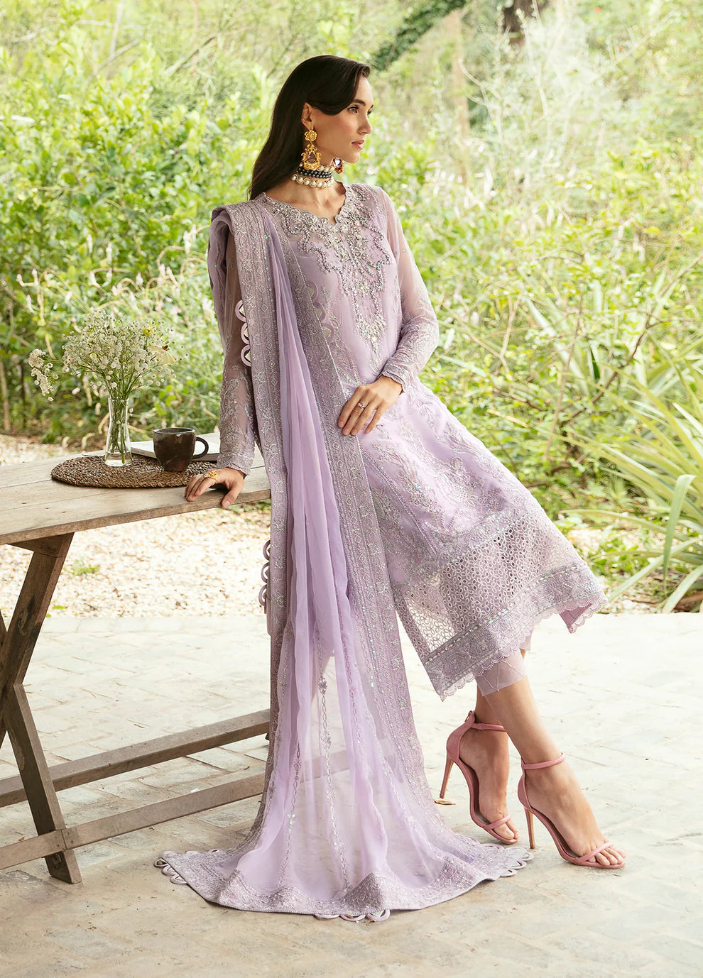 Model wearing Gulaal Viola lavender embroidered Eid dress, Suffuse accents, luxe Pakistani clothes UK.